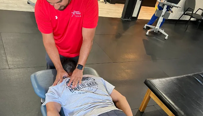 One-on-one physical therapy treatment at Avila Physical Therapy